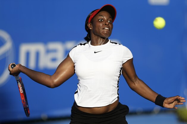 Sloane Stephens of the U.S. returns a ball against Switzerland's Stefanie Voegele in their quarterfinal match at the Mexican Tennis Open in Acapulco, Mexico, Thursday, March 1, 2018.(AP Photo/Rebecca Blackwell)