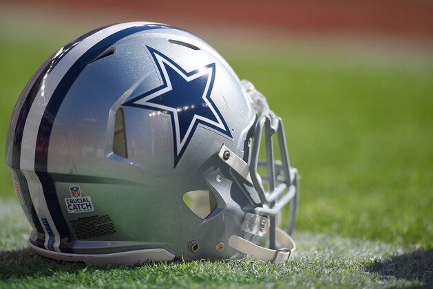 SANTA CLARA, CA - OCTOBER 22:  A detailed view of a helmet belonging to a Dallas Cowboys player sitting on the field prior to the start of an NFL football game against the San Francisco 49ers at Levi's Stadium on October 22, 2017 in Santa Clara, California.  (Photo by Thearon W. Henderson/Getty Images)