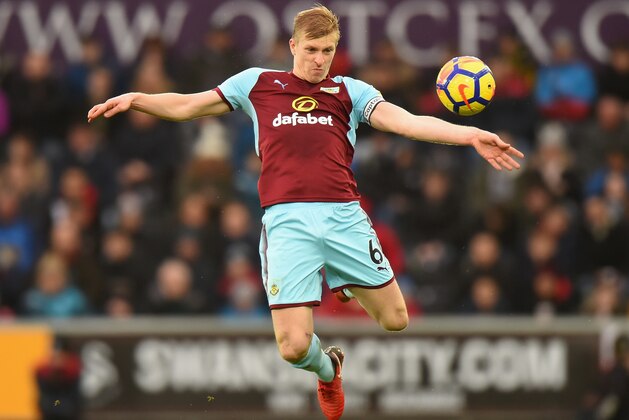 SWANSEA, WALES - FEBRUARY 10:  Ben Mee of Burnley during the Premier League match between Swansea City and Burnley at Liberty Stadium on February 10, 2018 in Swansea, Wales.  (Photo by Tony Marshall/Getty Images)