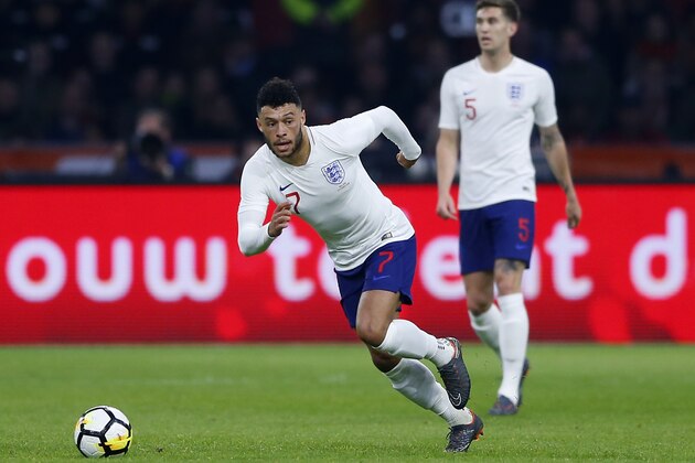 England's Alex Oxlade-Chamberlain controls the ball during the international friendly soccer match between the Netherlands and England at the Amsterdam ArenA in Amsterdam, Netherlands, Friday, March 23, 2018. (AP Photo/Peter Dejong)