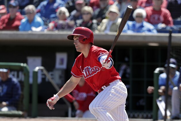 FILE - In this March 13, 2018, file photo, Philadelphia Phillies' Scott Kingery bats in a spring baseball exhibition game against the Tampa Bay Rays,  in Clearwater, Fla.  Kingery has shown the Phillies he's ready to play in the majors even if it takes a bit longer for him to get there. Kingery is considered the top second-base prospect in baseball and already has been compared to Craig Biggio and Dustin Pedroia. But Cesar Hernandez is Philadelphia's starting second baseman so Kingery has been playing other positions in spring training.(AP Photo/John Raoux, File)