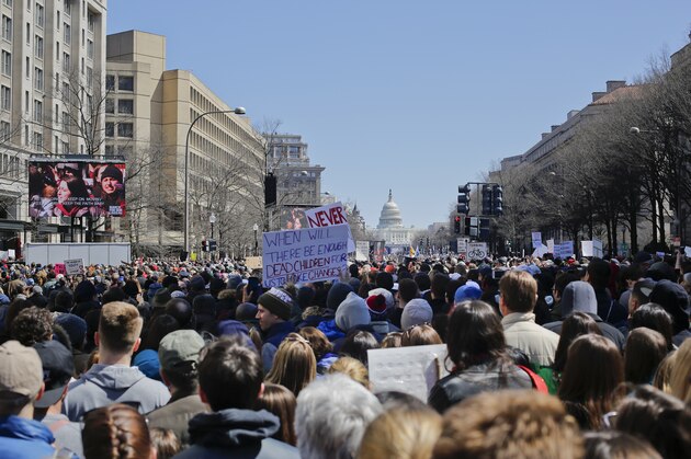 People gather on Pennsylvania Ave., during the