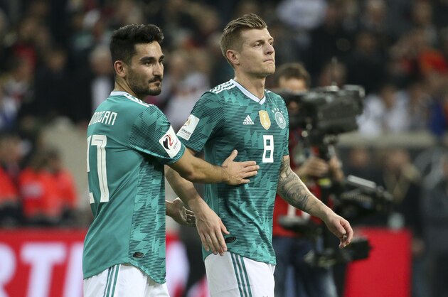 DUESSELDORF, GERMANY - MARCH 23: Ilkay Gundogan, Toni Kroos of Germany following the international friendly match between Germany and Spain at Esprit-Arena on March 23, 2018 in Duesseldorf, Germany. (Photo by Jean Catuffe/Getty Images)