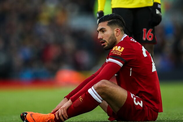 LIVERPOOL, ENGLAND - MARCH 17: Emre Can of Liverpool picks up an injury which results in him being taken off during the Premier League match between Liverpool and Watford at Anfield on March 17, 2018 in Liverpool, England. (Photo by Robbie Jay Barratt - AMA/Getty Images)