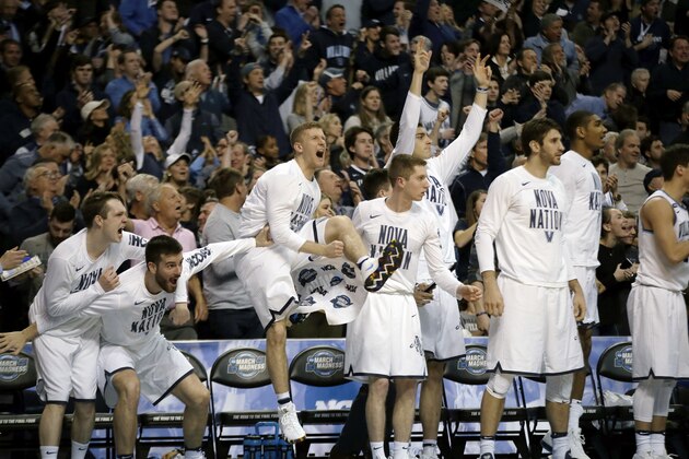Players on the Villanova bench react to a basket against Texas Tech during the second half of an NCAA men's college basketball tournament regional final, Sunday, March 25, 2018, in Boston. (AP Photo/Elise Amendola)