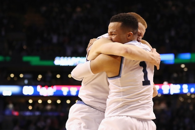 BOSTON, MA - MARCH 25:  Jalen Brunson #1 of the Villanova Wildcats celebrates with Donte DiVincenzo #10 after defeating the Texas Tech Red Raiders 71-59 in the 2018 NCAA Men's Basketball Tournament East Regional to advance to the 2018 Final Four at TD Garden on March 25, 2018 in Boston, Massachusetts.  (Photo by Elsa/Getty Images)