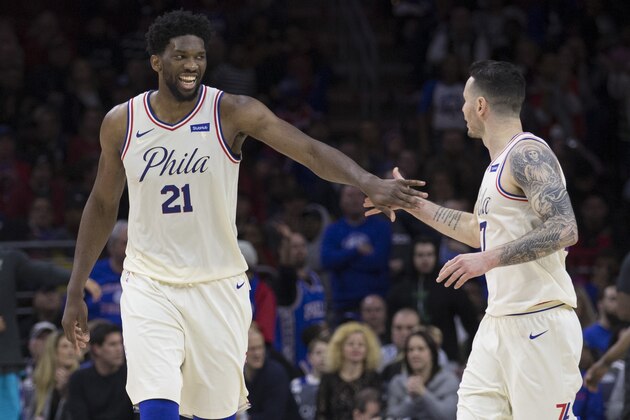 PHILADELPHIA, PA - MARCH 2: Joel Embiid #21 of the Philadelphia 76ers celebrates with JJ Redick #17 in the fourth quarter against the Charlotte Hornets at the Wells Fargo Center on March 2, 2018 in Philadelphia, Pennsylvania. The 76ers defeated the Hornets 110-99. NOTE TO USER: User expressly acknowledges and agrees that, by downloading and or using this photograph, User is consenting to the terms and conditions of the Getty Images License Agreement. (Photo by Mitchell Leff/Getty Images)