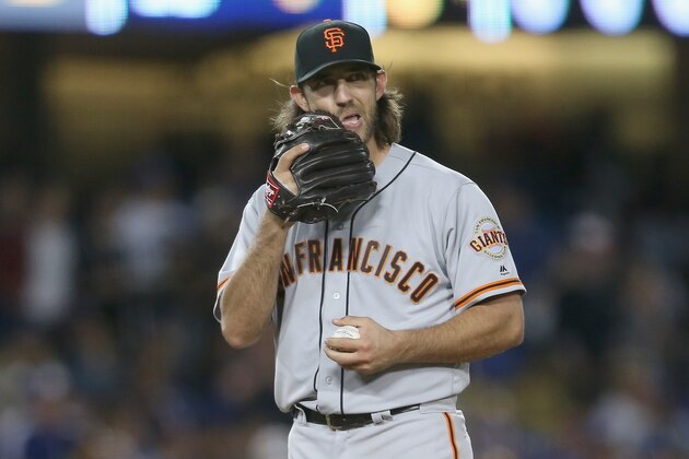 LOS ANGELES, CA - SEPTEMBER 23:  Starting pitcher Madison Bumgarner #40 of the San Francisco Giants reacts after giving up a home run to Austin Barnes #15 of the Los Angeles Dodgers in the eighth inning at Dodger Stadium on September 23, 2017 in Los Angeles, California.  (Photo by Stephen Dunn/Getty Images)