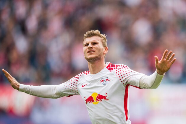 Leipzig´s forward Timo Werner celebrates scoring during the German dirst division Bundesliga football match between RB Leipzig and Eintracht Frankfurt in Leipzig, eastern Germany, on September 23, 2017. / AFP PHOTO / ROBERT MICHAEL / RESTRICTIONS: DURING MATCH TIME: DFL RULES TO LIMIT THE ONLINE USAGE TO 15 PICTURES PER MATCH AND FORBID IMAGE SEQUENCES TO SIMULATE VIDEO. == RESTRICTED TO EDITORIAL USE == FOR FURTHER QUERIES PLEASE CONTACT DFL DIRECTLY AT + 49 69 650050
        (Photo credit should read ROBERT MICHAEL/AFP/Getty Images)