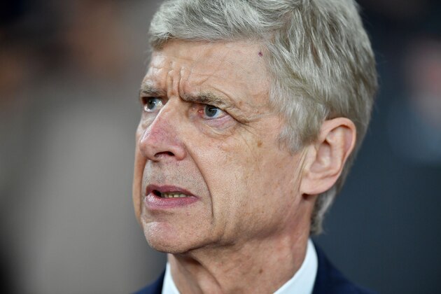 Arsenal's French manager Arsene Wenger looks on before the UEFA Europa League round of 16 second-leg football match  between Arsenal and AC Milan at the Emirates Stadium in London on March 15, 2018.  / AFP PHOTO / Ben STANSALL        (Photo credit should read BEN STANSALL/AFP/Getty Images)