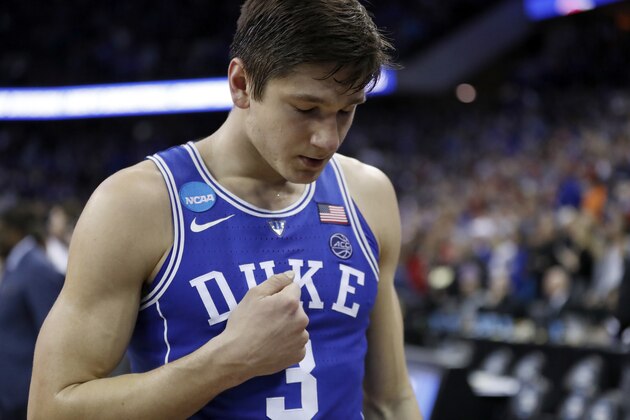 Duke's Grayson Allen walks off the court after a regional final game against Kansas in the NCAA men's college basketball tournament Sunday, March 25, 2018, in Omaha, Neb. Kansas won 85-81 in overtime. (AP Photo/Nati Harnik)
