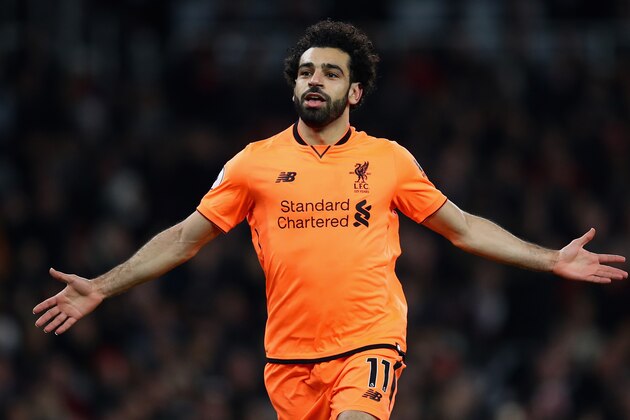 LONDON, ENGLAND - DECEMBER 22:  Mohamed Salah of Liverpool celebrates his teams second goal during the Premier League match between Arsenal and Liverpool at Emirates Stadium on December 22, 2017 in London, England.  (Photo by Julian Finney/Getty Images)
