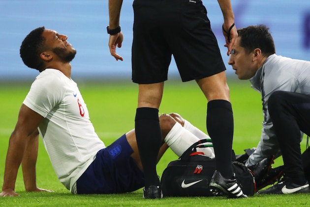 AMSTERDAM, NETHERLANDS - MARCH 23:  Joe Gomez of England is given treatment during the international friendly match between Netherlands and England at Johan Cruyff Arena on March 23, 2018 in Amsterdam, Netherlands.  (Photo by Dean Mouhtaropoulos/Getty Images)