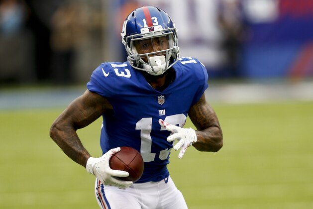 EAST RUTHERFORD, NJ - OCTOBER 08:  Odell Beckham #13 of the New York Giants runs in for a touchdown  during their game against Los Angeles Chargers at MetLife Stadium on October 8, 2017 in East Rutherford, New Jersey. (Photo by Jeff Zelevansky/Getty Images)