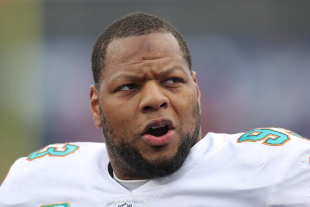 BUFFALO, NY - DECEMBER 17: Ndamukong Suh #93 of the Miami Dolphins during NFL game action against the Buffalo Bills at New Era Field on December 17, 2017 in Buffalo, New York. (Photo by Tom Szczerbowski/Getty Images)
