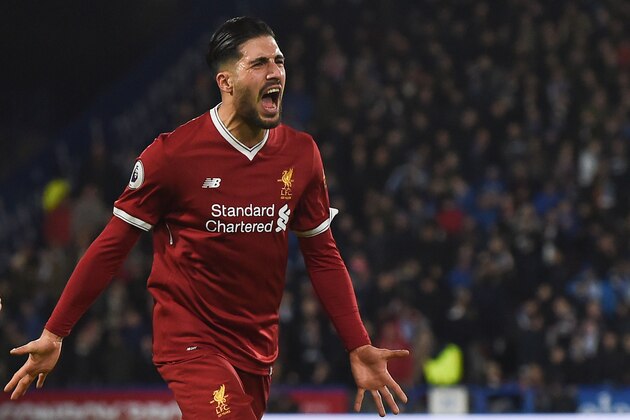 Liverpool's German midfielder Emre Can celebrates scoring the opening goal during the English Premier League football match between Huddersfield Town and Liverpool at the John Smith's stadium in Huddersfield, northern England on January 30, 2018. / AFP PHOTO / PAUL ELLIS / RESTRICTED TO EDITORIAL USE. No use with unauthorized audio, video, data, fixture lists, club/league logos or 'live' services. Online in-match use limited to 75 images, no video emulation. No use in betting, games or single club/league/player publications.  /         (Photo credit should read PAUL ELLIS/AFP/Getty Images)