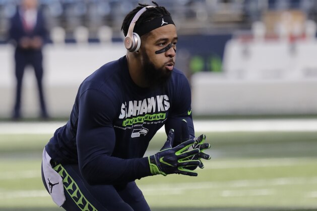 Seattle Seahawks free safety Earl Thomas warms up before an NFL football game against the Arizona Cardinals, Sunday, Dec. 31, 2017, in Seattle. (AP Photo/Elaine Thompson)