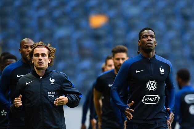 France's forward Antoine Griezmann (L) and midfielder Paul Pogba attends a training session of the French national football team on the eve of the WC 2018 football qualification match between Sweden and France in Solna, on June 8, 2017.  / AFP PHOTO / Jonathan NACKSTRAND        (Photo credit should read JONATHAN NACKSTRAND/AFP/Getty Images)