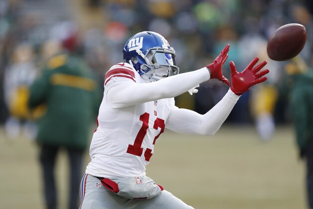 New York Giants wide receiver Odell Beckham (13) warms up before an NFC wild-card NFL football game against the Green Bay Packers, Sunday, Jan. 8, 2017, in Green Bay, Wis. (AP Photo/Matt Ludtke)
