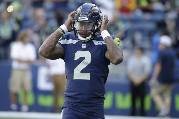 Seattle Seahawks backup quarterback Trevone Boykin stands on the field during warmups before an NFL football preseason game against the Kansas City Chiefs, Friday, Aug. 25, 2017, in Seattle. (AP Photo/Elaine Thompson)