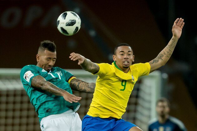 BERLIN, GERMANY - MARCH 27: Jerome Boateng of Germany and Gabriel Jesus of Brazil battle for the ball during the international friendly match between Germany and Brazil at Olympiastadion on March 27, 2018 in Berlin, Germany. (Photo by TF-Images/Getty Images)