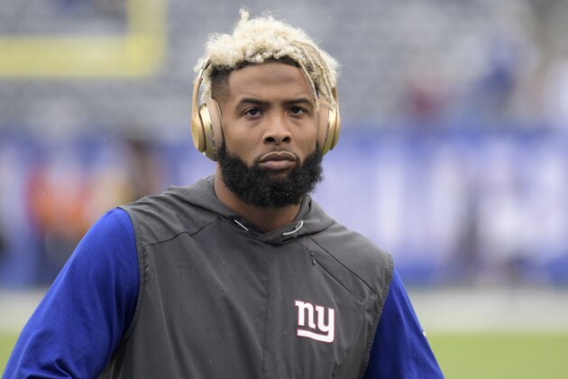 File-This Oct. 8, 2017, file photo shows New York Giants wide receiver Odell Beckham warming up prior to an NFL football game against the Los Angeles Chargers in East Rutherford, N.J.  New York Giants owner John Mara says the team does not have Odell Beckham Jr., on the trading block, then stopped short Sunday of saying the controversial star receiver is an untouchable. (AP Photo/Bill Kostroun, File)