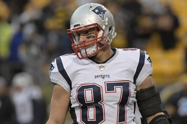 New England Patriots tight end Rob Gronkowski (87) warms up before an NFL football game against the Pittsburgh Steelers in Pittsburgh, Sunday, Dec. 17, 2017. (AP Photo/Don Wright)