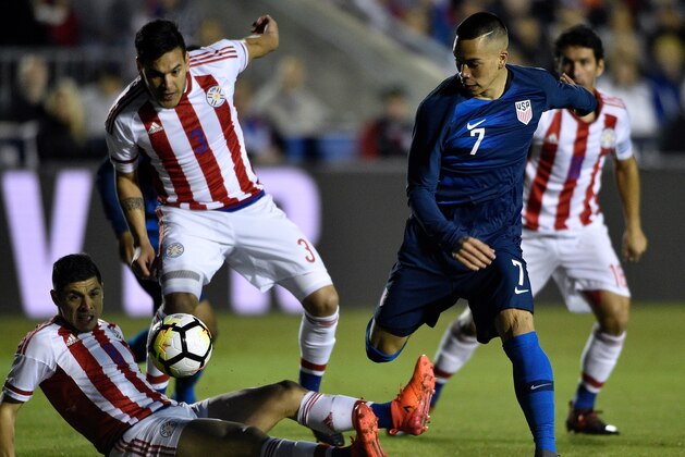CARY, NC - MARCH 27:  Bobby Wood #7 of United States battles Bruno Valdez #5 and Gustavo Gomez #3 of Paraguay for the ball during their game at WakeMed Soccer Park on March 27, 2018 in Cary, North Carolina.  (Photo by Grant Halverson/Getty Images)