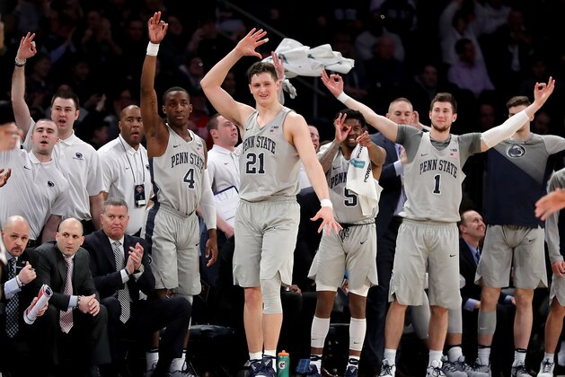 NEW YORK, NY - MARCH 27: The Penn State Nittany Lions bench celebrates in the second quarter against the Mississippi State Bulldogs during their 2018 National Invitation Tournament Championship semifinals game at Madison Square Garden on March 27, 2018 in New York City.  (Photo by Abbie Parr/Getty Images)