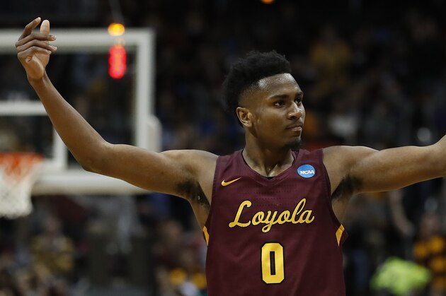 Loyola-Chicago guard Donte Ingram (0) celebrates a basket against Kansas State during the second half of a regional final NCAA college basketball tournament game, Saturday, March 24, 2018, in Atlanta. (AP Photo/David Goldman)