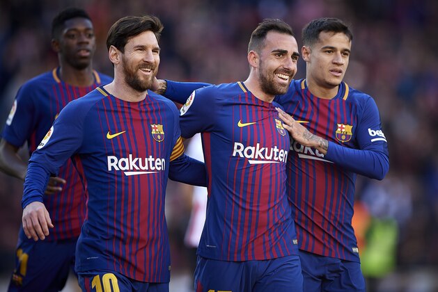BARCELONA, SPAIN - MARCH 18:  Paco Alcacer (C) of Barcelona celebrates with Lionel Messi (L) and Philippe Coutinho (R) of Barcelona after scorin a goal during the La Liga match between Barcelona and Athletic Club at Camp Nou on March 18, 2018 in Barcelona, Spain.  (Photo by Quality Sport Images/Getty Images)