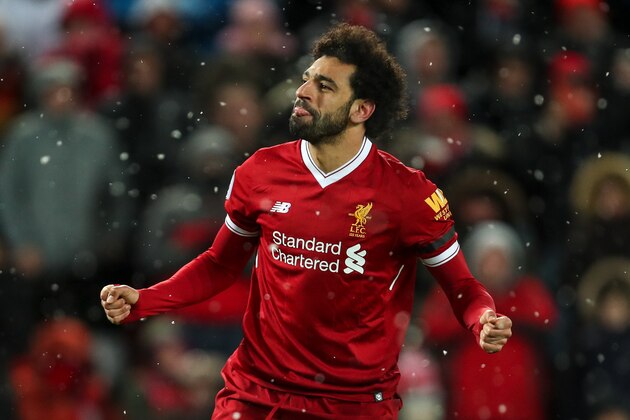 LIVERPOOL, ENGLAND - MARCH 17: Mohamed Salah of Liverpool celebrates after scoring a goal to make it 4-0 during the Premier League match between Liverpool and Watford at Anfield on March 17, 2018 in Liverpool, England. (Photo by Robbie Jay Barratt - AMA/Getty Images)