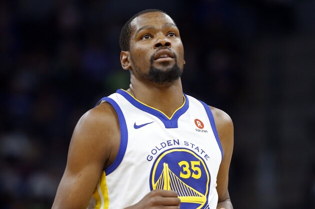 Golden State Warriors' Kevin Durant plays against the Minnesota Timberwolves in the second half of an NBA basketball game Sunday, March 11, 2018, in Minneapolis. (AP Photo/Jim Mone)