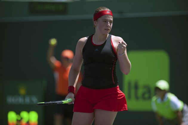Jelena Ostapenko, of Latvia, reacts after winning the first set against Elina Svitolina, of Ukraine, during the Miami Open tennis tournament Wednesday, March 28, 2018, in Key Biscayne, Fla. Ostapenko won 7-6 (3), 7-6 (5). (AP Photo/Gaston De Cardenas)