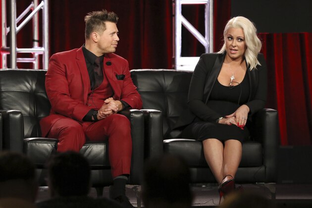 The Miz, left, and Maryse participate in the