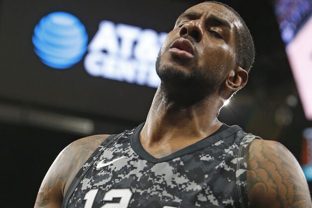 SAN ANTONIO,TX - MARCH 21 :  LaMarcus Aldridge #12 of the San Antonio Spurs reacts after being during game against the Washington Wizards at AT&T Center on March 21, 2018  in San Antonio, Texas.  NOTE TO USER: User expressly acknowledges and agrees that , by downloading and or using this photograph, User is consenting to the terms and conditions of the Getty Images License Agreement. (Photo by Ronald Cortes/Getty Images)