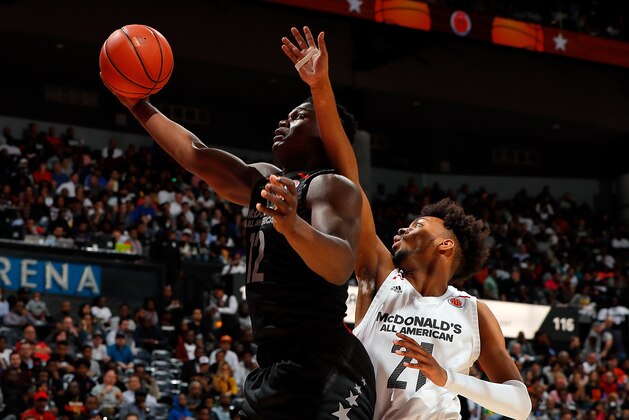 ATLANTA, GA - MARCH 28:  Zion Williamson #12 of Spartanburg Day School grabs a rebound against Jordan Brown #21 of Prolific Prep during the 2018 McDonald's All American Game at Philips Arena on March 28, 2018 in Atlanta, Georgia.  (Photo by Kevin C. Cox/Getty Images)