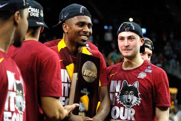 ATLANTA, GA - MARCH 24:  Ben Richardson #14 of the Loyola Ramblers celebrates after defeating the Kansas State Wildcats during the 2018 NCAA Men's Basketball Tournament South Regional at Philips Arena on March 24, 2018 in Atlanta, Georgia. Loyola defeated Kansas State 78-62 to advance to the Final Four.  (Photo by Kevin C. Cox/Getty Images)