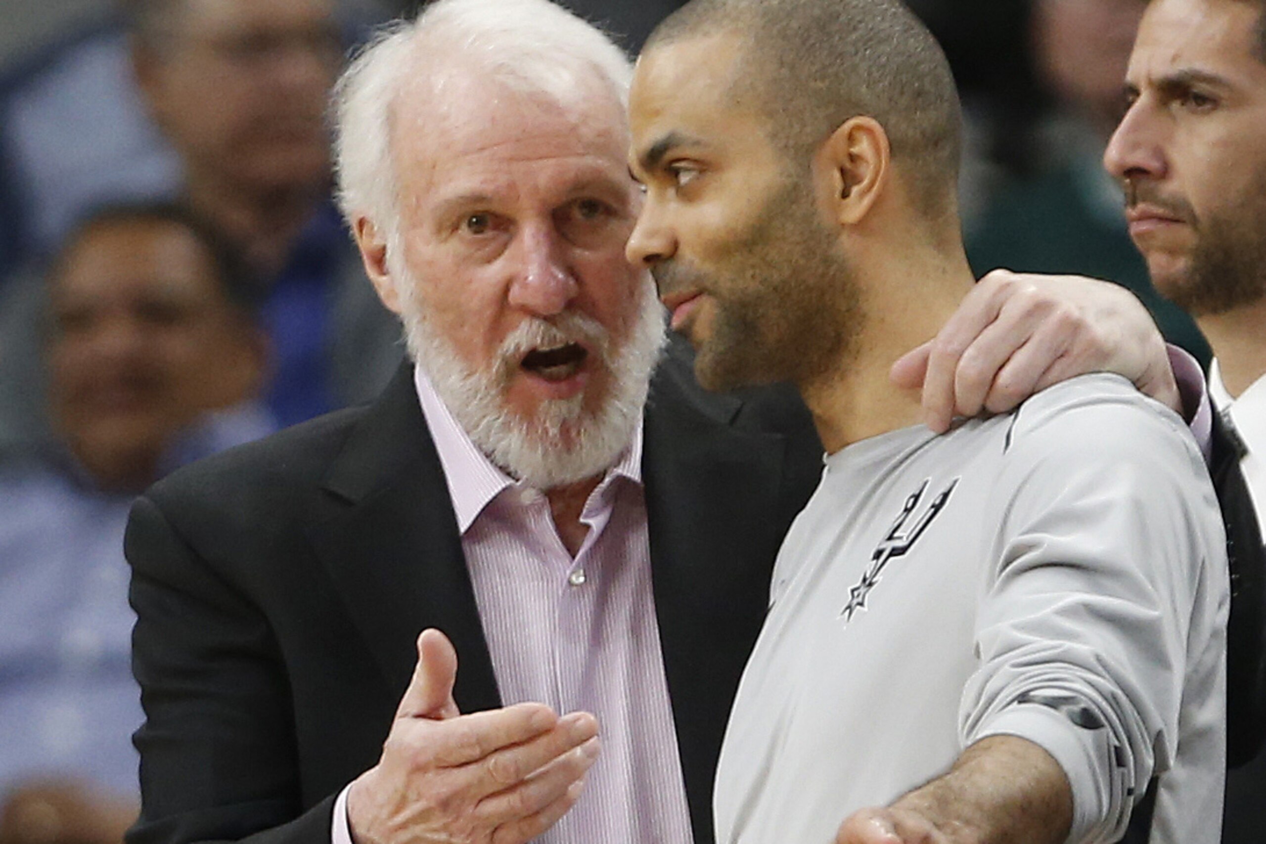 SAN ANTONIO,TX - MARCH 15:  Gregg Popvich head coach of the San Antonio Spurs talks with Tony Parker #9 of the San Antonio Spurs during game against the New Orleans Pelicans at AT&T Center on March 15, 2018  in San Antonio, Texas.  NOTE TO USER: User expressly acknowledges and agrees that , by downloading and or using this photograph, User is consenting to the terms and conditions of the Getty Images License Agreement. (Photo by Ronald Cortes/Getty Images)