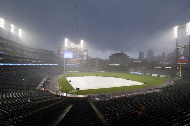 Rain falls on Comerica Park before a Detroit Tigers baseball game against the Boston Red Sox Saturday, Aug. 20, 2016, in Detroit. (AP Photo/Duane Burleson)