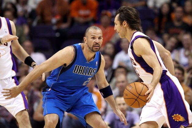 PHOENIX, AZ - MARCH 27:  Steve Nash #13 of the Phoenix Suns drives the ball past Jason Kidd #2 of the Dallas Mavericks during the NBA game at US Airways Center on March 27, 2011 in Phoenix, Arizona.  NOTE TO USER: User expressly acknowledges and agrees that, by downloading and or using this photograph, User is consenting to the terms and conditions of the Getty Images License Agreement.  (Photo by Christian Petersen/Getty Images)