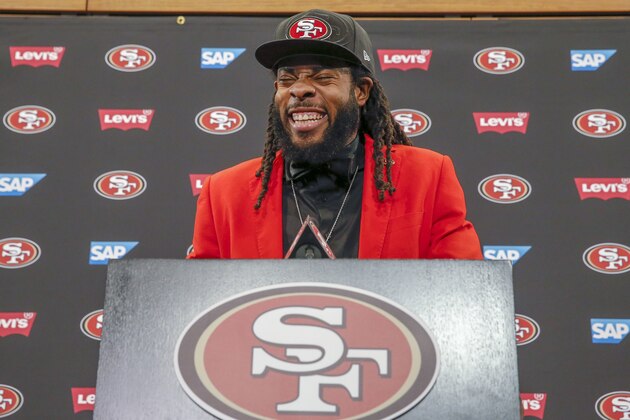 New San Francisco 49ers cornerback Richard Sherman laughs as he answers questions during an NFL football news conference in Santa Clara, Calif., Tuesday, March 20, 2018. Sherman agreed to a three-year deal with the 49ers. (AP Photo/Tony Avelar)