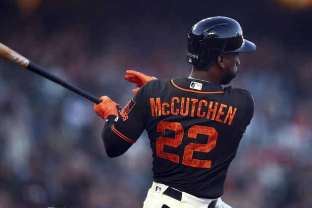 San Francisco Giants' Andrew McCutchen swings against the Oakland Athletics during a spring training baseball game on Monday, March 26, 2018 in San Francisco. (AP Photo/Ben Margot)