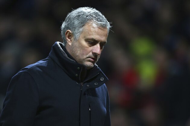 Manchester United head coach Jose Mourinho walks to the dressing room aft half time during the Champions League round of 16 second leg soccer match between Manchester United and Sevilla, at Old Trafford in Manchester, England, Tuesday, March 13, 2018. (AP Photo/Dave Thompson)