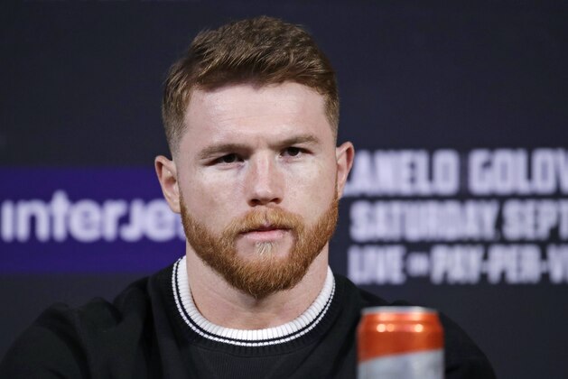 Canelo Alvarez attends a news conference Wednesday, Sept. 13, 2017, in Las Vegas. Alvarez is scheduled to fight Gennady Golovkin in a middleweight title fight Saturday in Las Vegas. (AP Photo/John Locher)