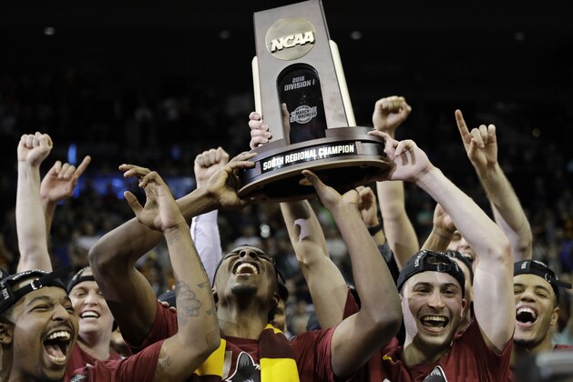 Loyola-Chicago players celebrate a regional final NCAA college basketball tournament game against Kansas State, Saturday, March 24, 2018, in Atlanta. Loyola-Chicago won 78-62. (AP Photo/David Goldman)