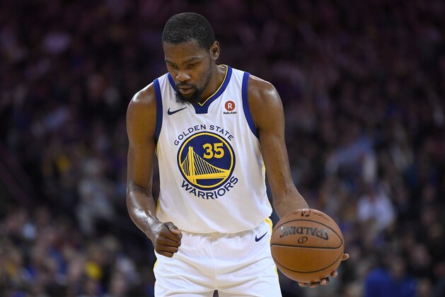 OAKLAND, CA - MARCH 14:  Kevin Durant #35 of the Golden State Warriors stands at the line to shoot a technical foul shot against the Los Angeles Lakers during an NBA basketball game at ORACLE Arena on March 14, 2018 in Oakland, California. NOTE TO USER: User expressly acknowledges and agrees that, by downloading and or using this photograph, User is consenting to the terms and conditions of the Getty Images License Agreement.  (Photo by Thearon W. Henderson/Getty Images)