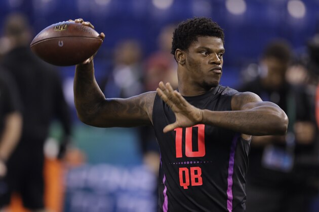 Louisville quarterback Lamar Jackson throws during a drill at the NFL football scouting combine, Saturday, March 3, 2018, in Indianapolis. (AP Photo/Darron Cummings)