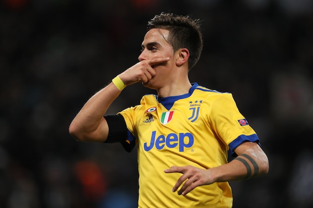 LONDON, ENGLAND - MARCH 07: Paulo Dybala of Juventus celebrates after scoring a goal to make it 1-2  during the UEFA Champions League Round of 16 Second Leg match between Tottenham Hotspur and Juventus at Wembley Stadium on March 7, 2018 in London, United Kingdom. (Photo by Matthew Ashton - AMA/Getty Images)