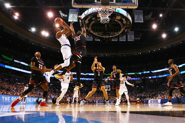 BOSTON, MA - MARCH 25:  Mikal Bridges #25 of the Villanova Wildcats shoots the ball against Norense Odiase #32 of the Texas Tech Red Raiders during the second half in the 2018 NCAA Men's Basketball Tournament East Regional at TD Garden on March 25, 2018 in Boston, Massachusetts.  (Photo by Maddie Meyer/Getty Images)